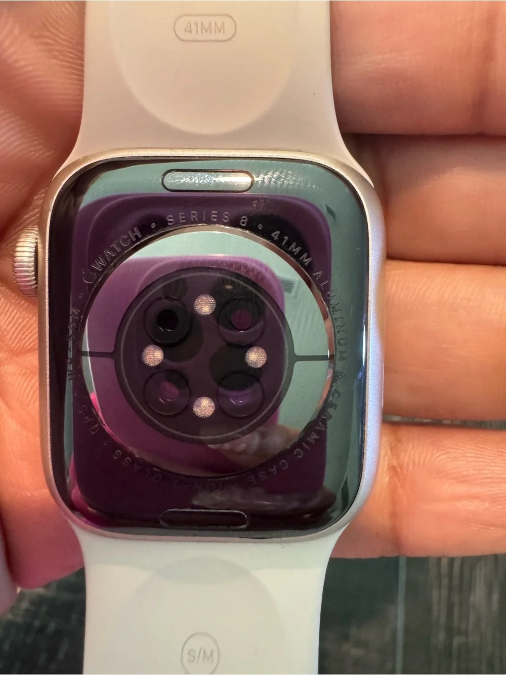Apple Watch with Pink Display and Light Gray Band